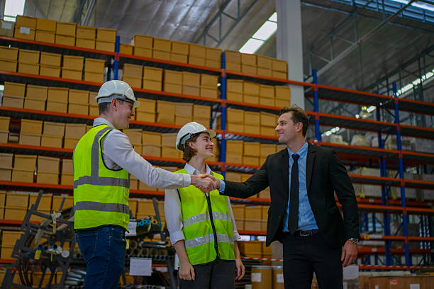 istock Blue collar workers are working and meeting at warehouse. 2220205174