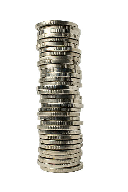 istock stack of coins. high wind of money coins on white background 2220212493