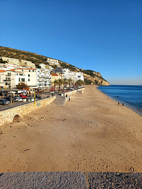 istock Sesimbra beach vista and beachfront promenade against hillside 2220213967