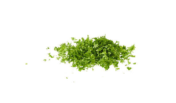 istock chopped fresh green parsley herbs isolated on white 2220214744