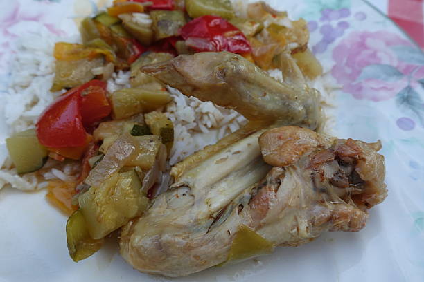 istock Roasted chicken wing served with basmati rice and ratatouille 2220215714
