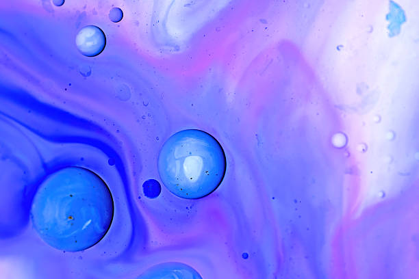 istock Bubbles in a fluid, extreme close-up, abstract background 2220219783