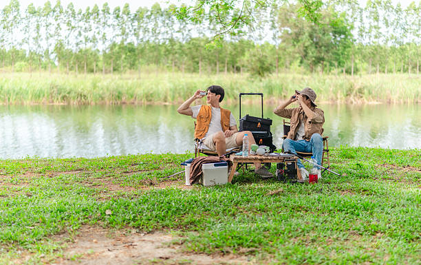 istock Friends Planning by the Lakeside Camp 2220224641