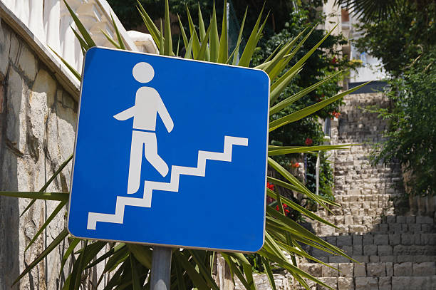 istock Icon of a man on the stairs 2220224822