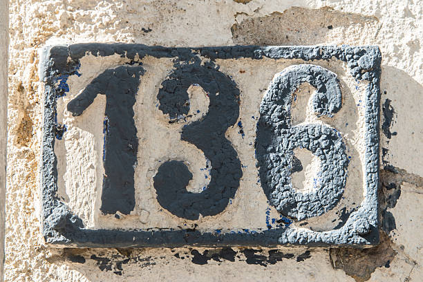 istock Old iron plate with number 136 2220229833