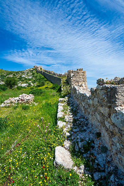 istock Akrokorinthos wall rising through spring hillside 2220231916