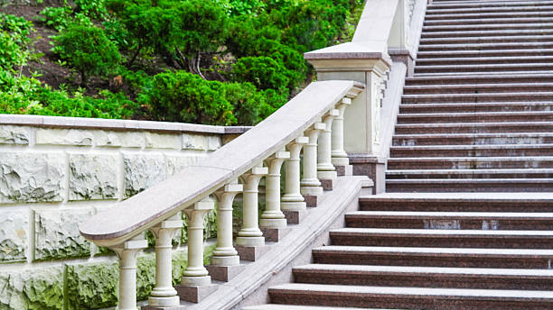 istock Elegant stone staircase with classical balustrade in urban park setting 2220252782
