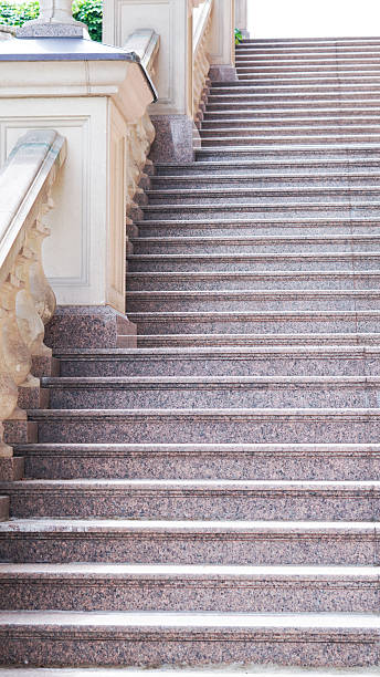 istock Elegant stone staircase with classical balustrade in urban park setting 2220253123