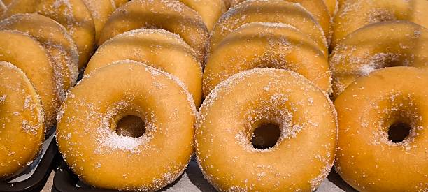 istock Sugar-dusted donuts are a Western-style snack. 2220253514