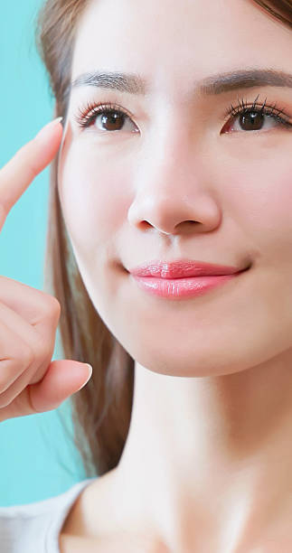 istock pretty Asian Woman Highlights Eyes 2220254375