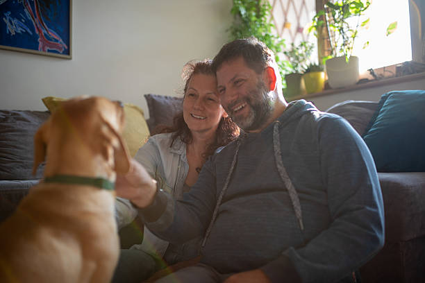istock Husband, wife and their dog 2220259108
