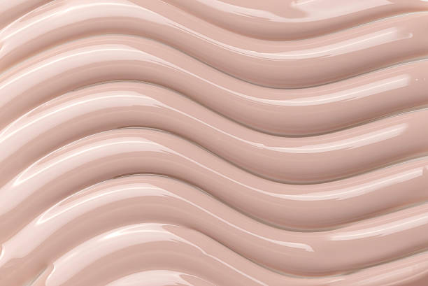 istock Glossy Beige Polish Gel Texture with Soft Wavy Pattern - Cosmetic Abstract Background. Studio Photography. 2220262029
