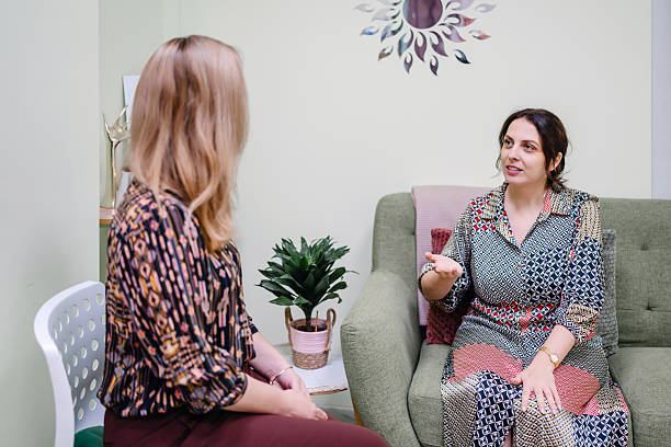 istock Energy psychologist conducting an alternative therapy with her patient 2220262205