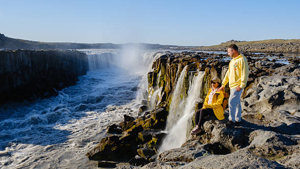 istock Visitors marvel at the stunning Selfoss waterfall in Iceland during a sunny afternoon 2220264379