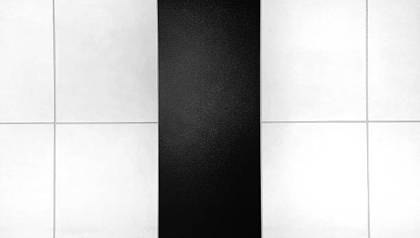 istock Black and white wall background in monochrome tone. Tile floor or wallpaper 2220266220