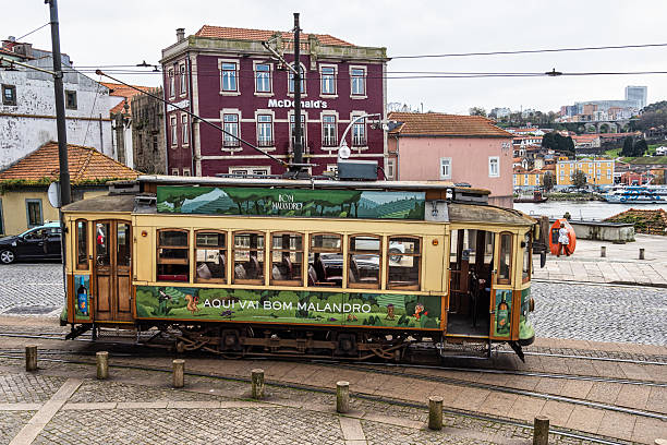 Porto, Portugal - Mar 21, 2024: Driving in a Porto heritage tram along the Douro river from Infante to Passeio Alegre