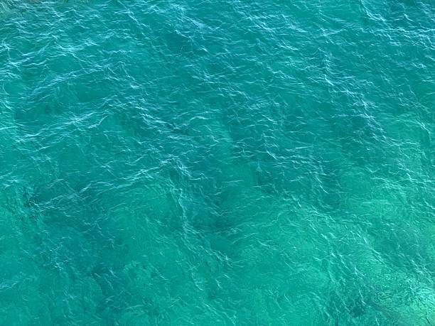 Water blue azure sea waves background.