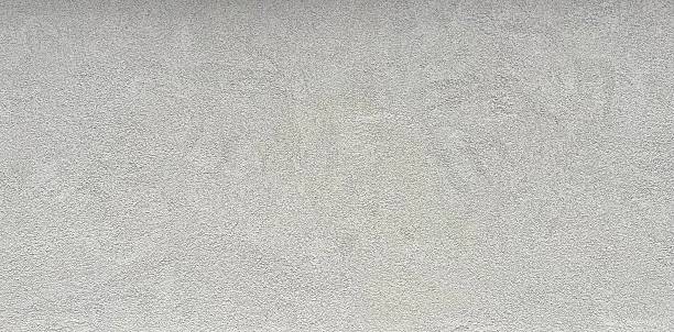istock Smooth Textured Gray Concrete Cement Wall Surface Ideal for Abstract Backgrounds 2220294427