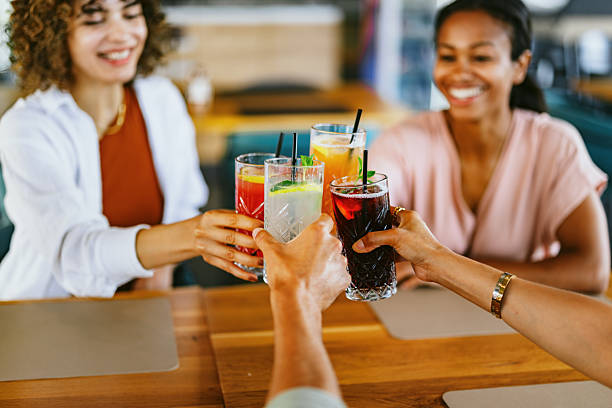 istock Friends Toast with Non-Alcoholic Drinks in a Restaurant Setting 2220301300