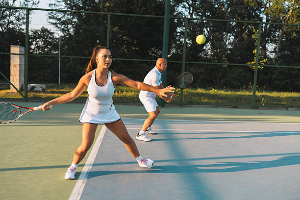 istock Coach Giving Game Tips During Tennis Practice 2220306011