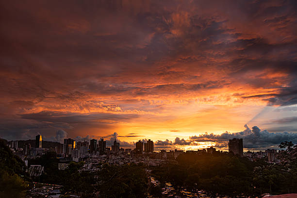 Beautiful panoramic of Manizales City with amazing sky, and buldings in sillohuettes.