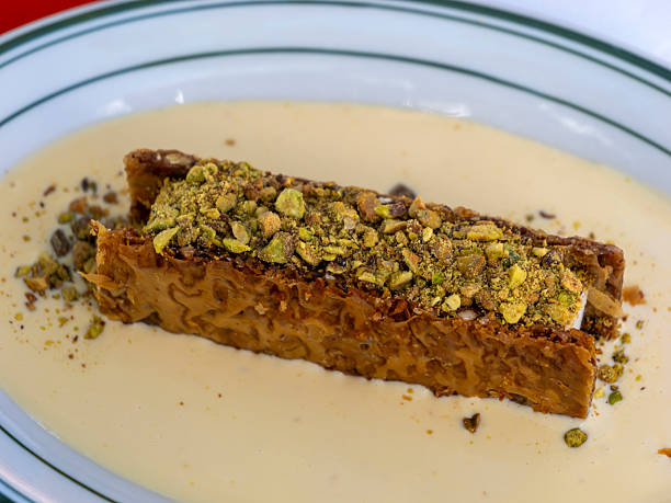 istock Ice cream served with pistachios and wafflers 2220311074