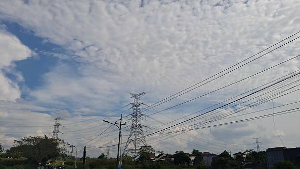 istock horizontal view of electric tower with beautiful clouds 2220311886