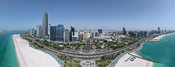 istock drone image uae abu dhabi and dubai panorama corniche and sheikh zayed road and burj khalifah 2220313157