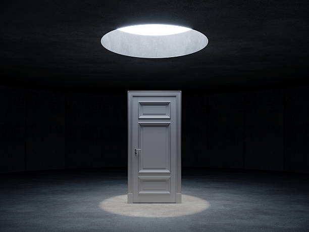 istock a white door in the dark room concrete space , 3d rendering 2220318776