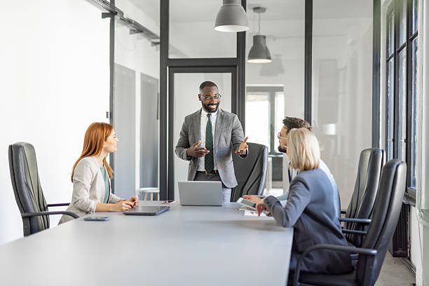 istock Group of Professionals Engaging in Healthy Discussion 2220319039