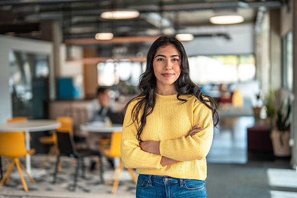 istock Confident Hispanic Woman in Coworking Space 2220320043