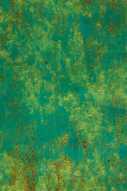 istock Rusty metal surface with peeling green paint outdoors 2220336585
