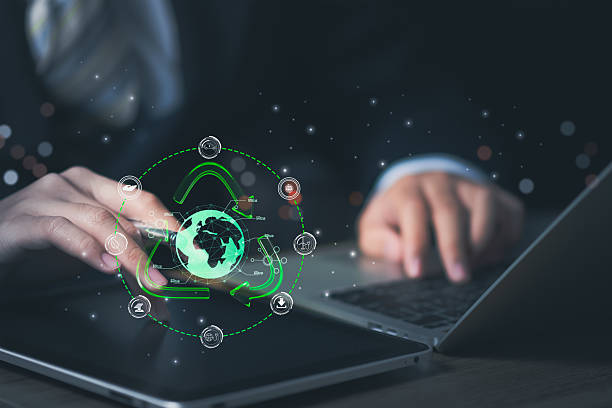 istock Businessman use smart technology, green sustainability icon and globe, symbolizing AI-driven recycling, eco-friendly ESG practice, circular economy, sustainable business environmental tech innovation. 2220344677