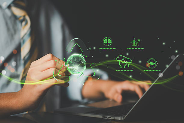 istock Businessman use smart technology, green sustainability icon and globe, symbolizing AI-driven recycling, eco-friendly ESG practice, circular economy, sustainable business environmental tech innovation. 2220344680