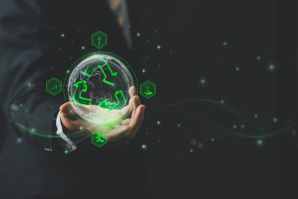 istock Businessman use smart technology, green sustainability icon and globe, symbolizing AI-driven recycling, eco-friendly ESG practice, circular economy, sustainable business environmental tech innovation. 2220344690