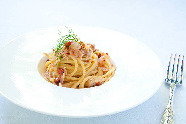 istock Spaghetti with pesto red onion and tuna 2220347499
