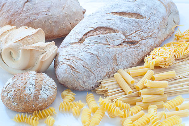 istock Different varieties of Italian pasta and homemade bread 2220353003