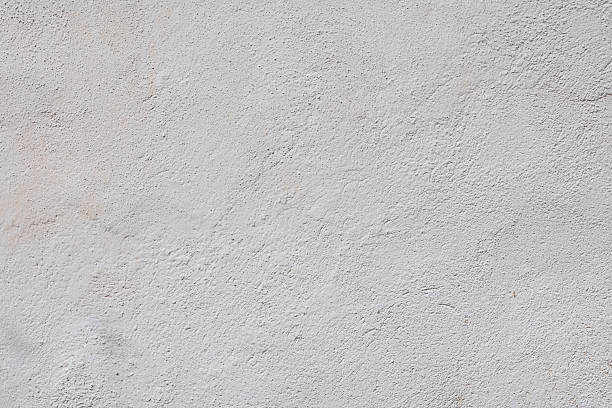 istock Neutral whitewash texture outdoor wall under daylight 2220353005