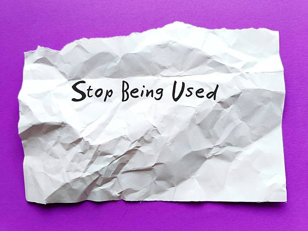 istock Torn crumple paper on purple background with text written Stop Being Used - Self reminder to avoid getting used by people who take advantage of you 2220355465