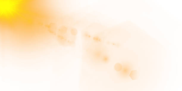 istock Radiant golden flares, glowing light beams, and glittering effects on a transparent or white background 2220355941