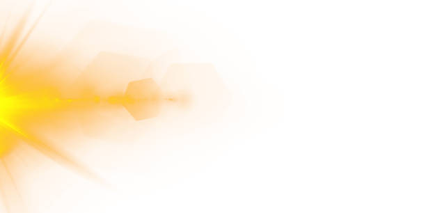 istock Radiant golden flares, glowing light beams, and glittering effects on a transparent or white background 2220356347
