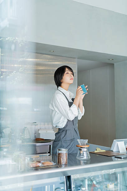 istock Female staff at a cafe 2220360484