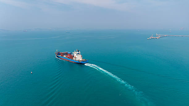 istock shipping logistic cargo container ship import export goods and distributing products to dealer and consumers across worldwide by container ship business and industry transportation 2220365218