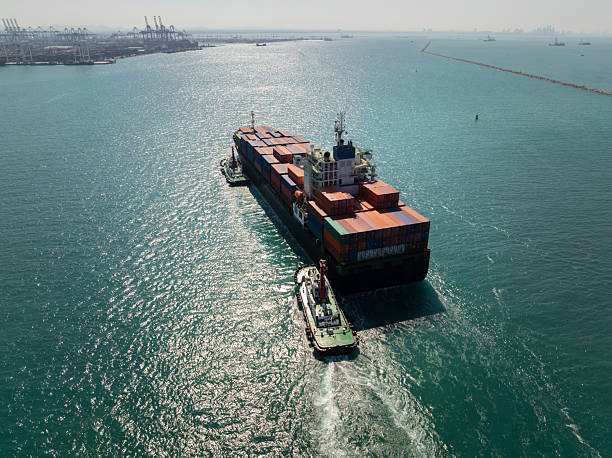 istock shipping logistic cargo container ship import export goods and distributing products to dealer and consumers across worldwide by container ship business and industry transportation 2220365429