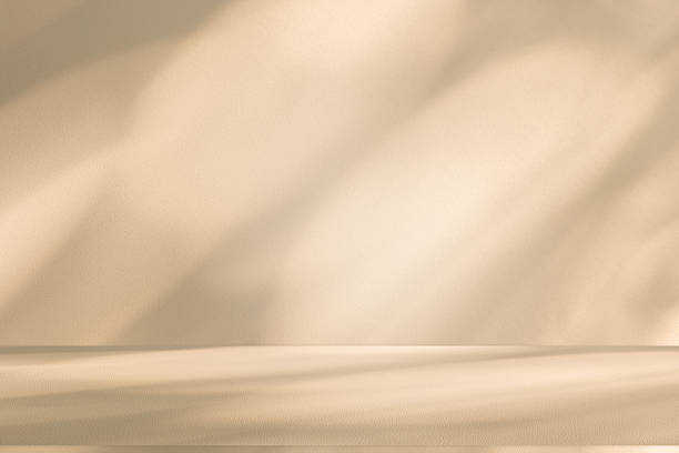istock Studio style background wall decoration presentation uses white and beige tones. with shadows cast from a nearby window, concept creating a decorative 2220366660