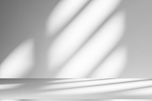 istock Wall interior background, studio and backdrops show products.with shadow from window color white . background for text insertion and presentation product 2220366693