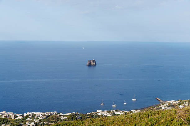 Distant view of Strombolicchio from the Stromboli island