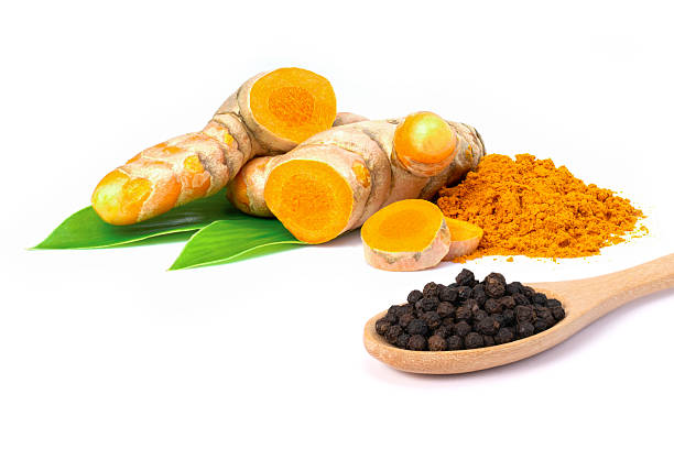 istock Turmeric powder and black pepper 2220369393