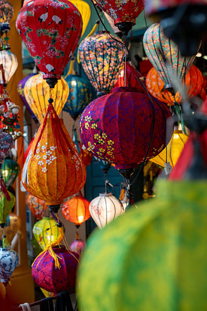 istock Colorful lanterns hang elegantly from the rooms ceiling 2220372582