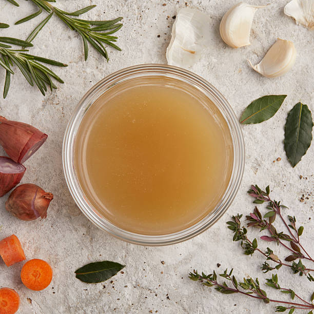 Light Vegetable Broth in a Glass Jar